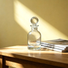 Klarglas-Parfümflasche mit rundem Stopfen für die Aromatherapie zu Hause